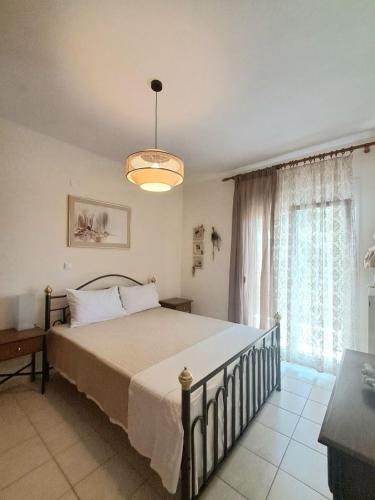 Gallery image of Menexe Apartments-Kelyfos in Neos Marmaras