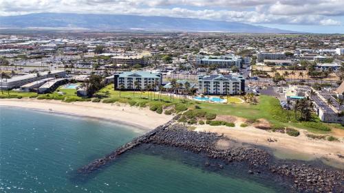 an aerial view of a beach and buildings at Hampton Inn & Suites Maui North Shore in Kahului