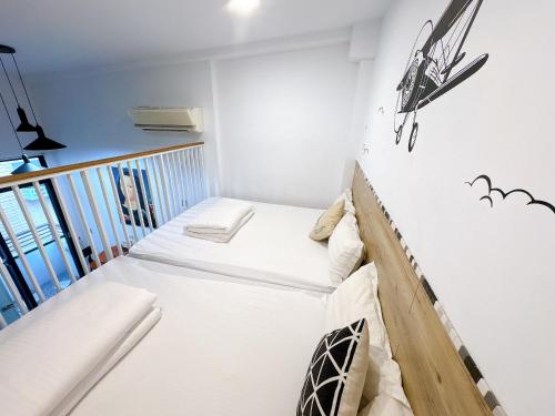 Postel nebo postele na pokoji v ubytování Haian Corner Homestay