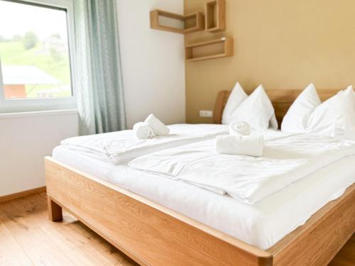 Postel nebo postele na pokoji v ubytování Gästehaus Erika - by myNests