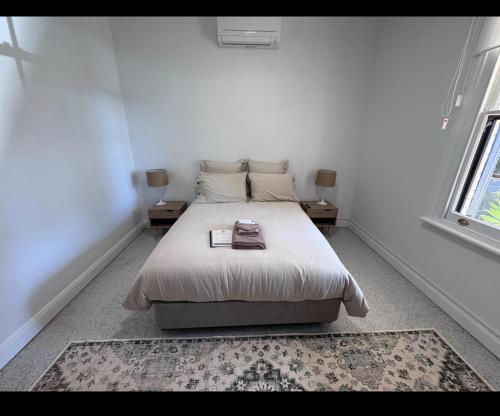 Ένα ή περισσότερα κρεβάτια σε δωμάτιο στο Perrington Estate