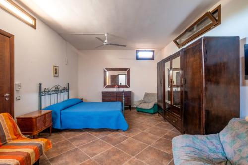 Una cama o camas en una habitación de Rosso Pepe