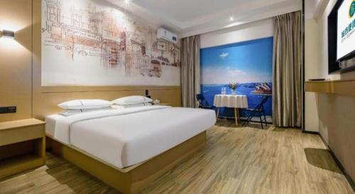 Cama o camas de una habitación en City Comfort Inn Nanning Railway Station Guangxi University