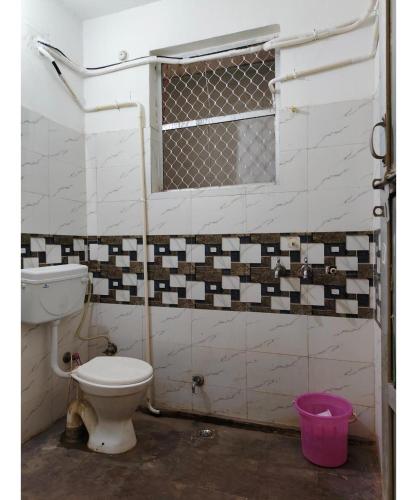 Ένα μπάνιο στο Gauri Shankar P Guest house