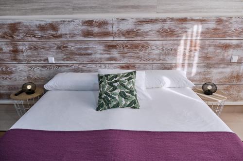 Ένα ή περισσότερα κρεβάτια σε δωμάτιο στο A TABERNA ROOMS