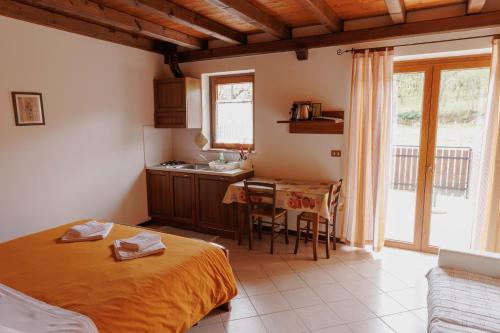 Ένα ή περισσότερα κρεβάτια σε δωμάτιο στο Agriturismo Radovic