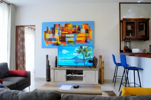 TV a/nebo společenská místnost v ubytování TB22 in PAZURI AT VIPINGO ESTATE