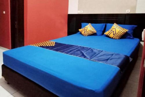 Cama o camas de una habitación en SPOT ON 3605 Clarichie Guest House