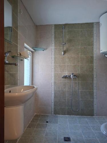 a bathroom with a shower and a sink at Villa Sveti Dimitar in Borovets