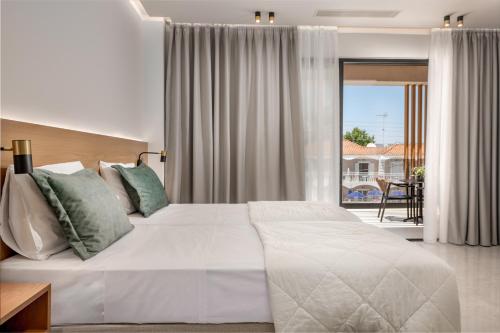 Ένα ή περισσότερα κρεβάτια σε δωμάτιο στο Canadian Hotel 
