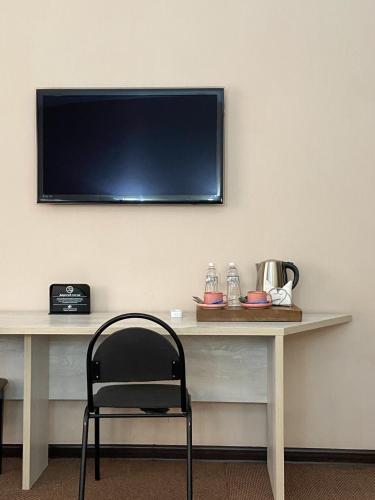 Keremet Hotelにあるテレビまたはエンターテインメントセンター