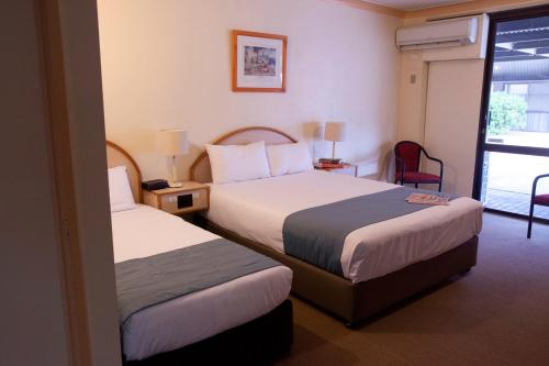 Katil atau katil-katil dalam bilik di Longreach Motor Inn
