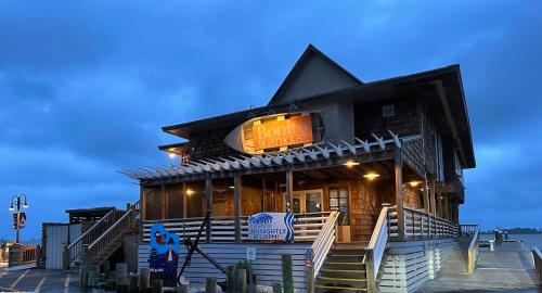 a building with a sign on the side of it at 174 Beach Club Villa in Fripp Island