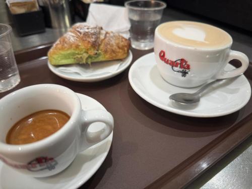a tray with a cup of coffee and a pastry at Bed&Dreams in Salento - Camera Matrimoniale Superior e ottima colazione in Guagnano