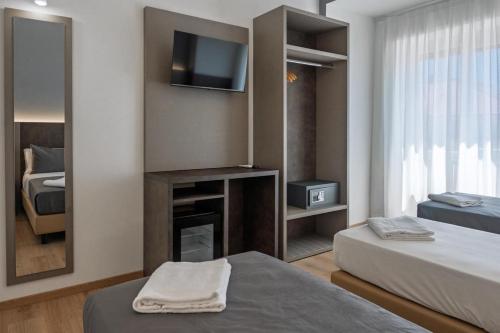 Ένα ή περισσότερα κρεβάτια σε δωμάτιο στο Liliya Rooms