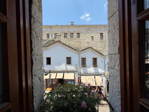 a view from a window of a building at Submarine 105 Rooms in Gjirokastër