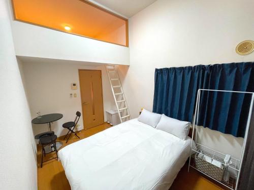 Postel nebo postele na pokoji v ubytování Momo-stay Sasahara Max 5p Loft room 12min to subway