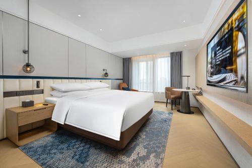Katil atau katil-katil dalam bilik di Wish Wenxu Hotel Changdachang Plaza Branch