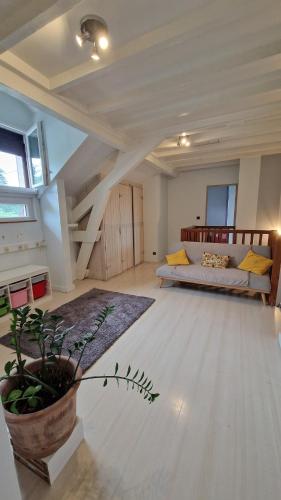 a large room with a bed and a staircase at House, Pool and Mountains in Myans