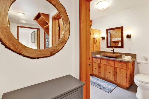 a bathroom with a sink and a mirror at Sugar Bear Pines #2493 in Sugarloaf