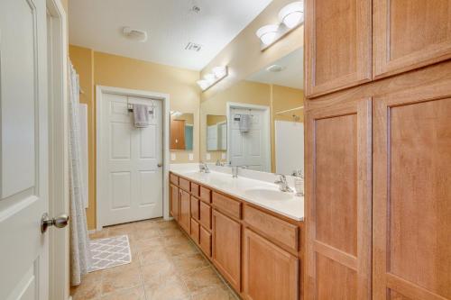a bathroom with a sink and a large mirror at Mountain View #11107 Surprise in Surprise