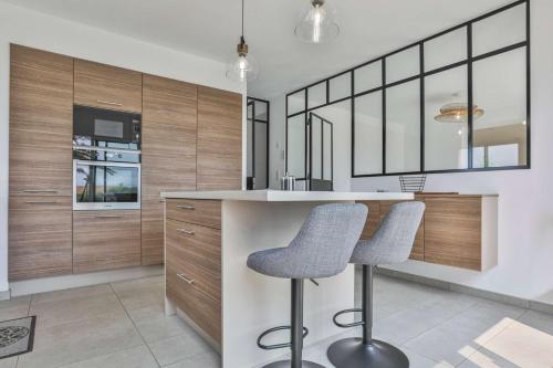 Køkken eller tekøkken på Villa au calme, proche de la mer