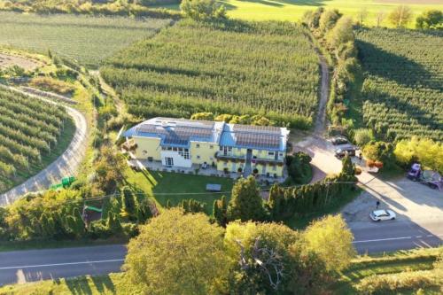 an aerial view of a house in a vineyard at Gartenhof in Brixen