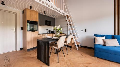 Kuchyň nebo kuchyňský kout v ubytování Jantar Resort Flatbook - Wynajem Apartamentów nad Morzem