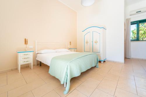 Katil atau katil-katil dalam bilik di Masseria San Biagio