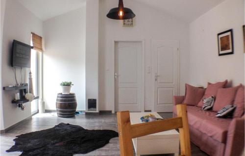 a living room with a couch and a table at Beautiful Home In Sveti Anton With Wifi in Sveti Anton