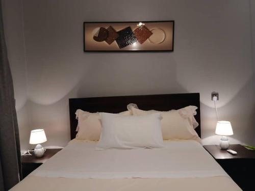 Ένα ή περισσότερα κρεβάτια σε δωμάτιο στο Angel Oak Residence Entebbe 2
