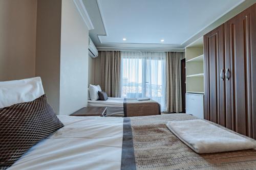 Grand Hamit Hotelにあるベッド