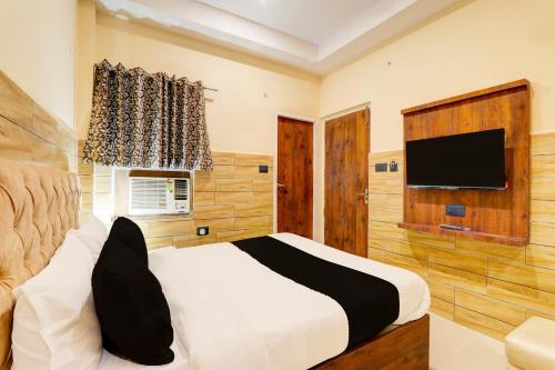 Μια τηλεόραση ή/και κέντρο ψυχαγωγίας στο Super Hotel O Kalpna Inn