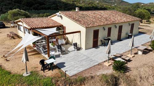 an aerial view of a house with a wooden deck at Molti Mari B&B Resort in Olbia