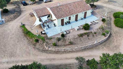 an overhead view of a house with a roof at Molti Mari B&B Resort in Olbia