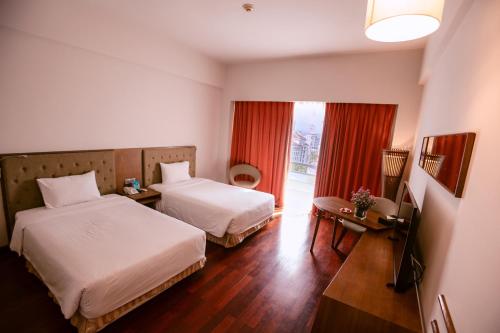 Katil atau katil-katil dalam bilik di Muong Thanh Holiday Hue Hotel
