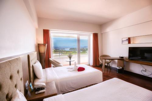Katil atau katil-katil dalam bilik di Muong Thanh Holiday Hue Hotel