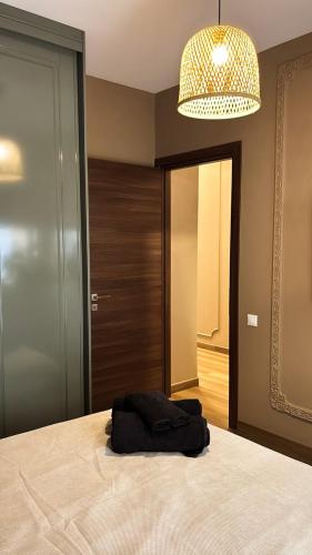Postel nebo postele na pokoji v ubytování Maison de Luxe