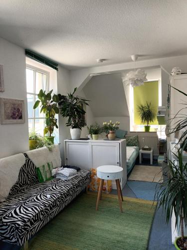 Posezení v ubytování Gästewohnung "Am Otto-Dix-Haus"