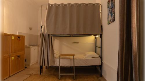 Ein Bett oder Betten in einem Zimmer der Unterkunft CoZi Coliving Djerba