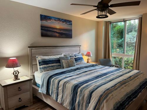Ένα ή περισσότερα κρεβάτια σε δωμάτιο στο Oceanside Beach Condos