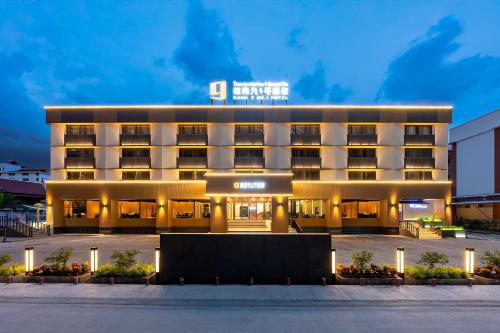 a hotel front of a building at night at Rama9 No1 Hotel in Bangkok