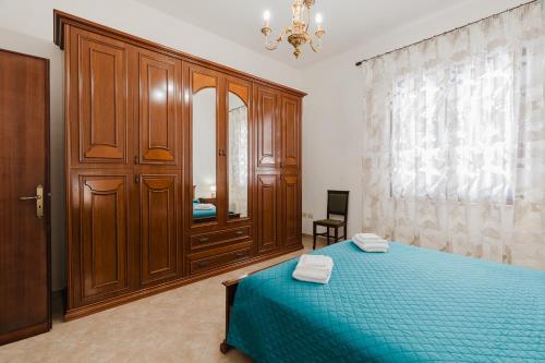 Postel nebo postele na pokoji v ubytování Casa La Piazzetta