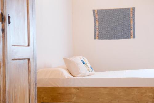 Ένα ή περισσότερα κρεβάτια σε δωμάτιο στο Agriturismo Cultisia Luogosanto