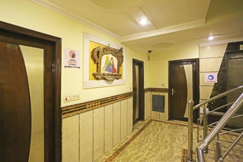 a hallway with a staircase in a building at Hotel Ratandeep at Paharganj in New Delhi