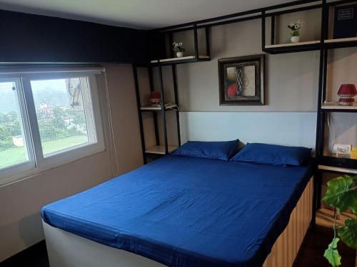 Postel nebo postele na pokoji v ubytování Heaven on Earth - Rishikesh