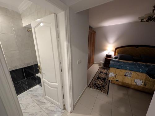 Ένα ή περισσότερα κρεβάτια σε δωμάτιο στο Tango home stay
