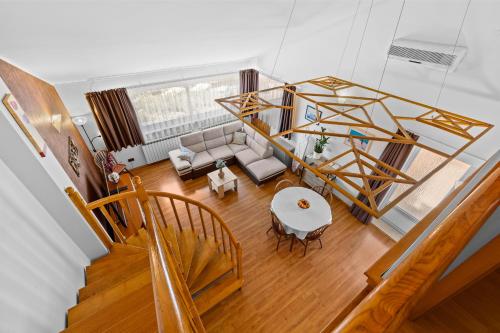 an overhead view of a living room with a table at Olea Magica Apartments in Rovinj