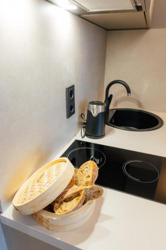 Kuchyň nebo kuchyňský kout v ubytování Aparthotel Aurum