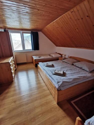 Postel nebo postele na pokoji v ubytování Privát SIMBA